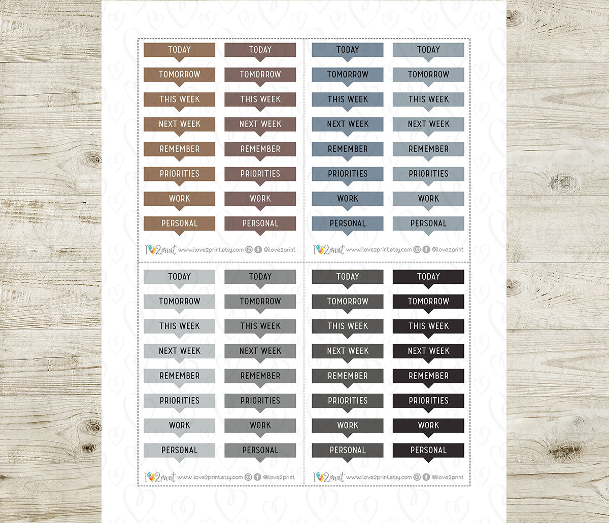 Sheet of planner stickers with various labels on a wooden surface