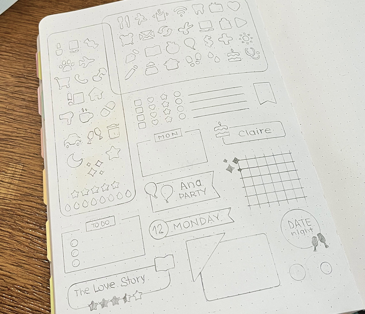 A bullet journal with many icons, labels, checklists hand drawn on it