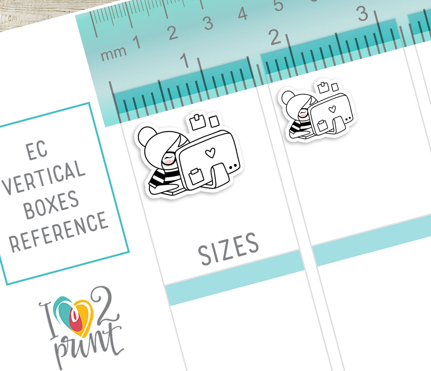 Sheet of EC Vertical Boxes Reference with 2 size stickers of a girl behind a laptop and a ruler for size measurement.