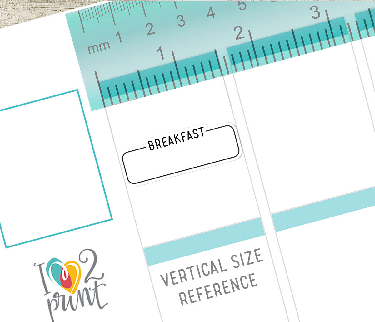 Vertical Planner page with a Breakfast sticker with a ruler and text labels on a white background