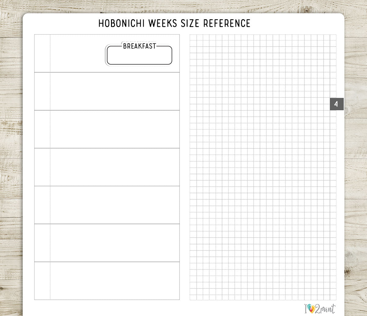 Hobonichi Weeks page size reference sheet with a Breakfast sticker on a wooden surface