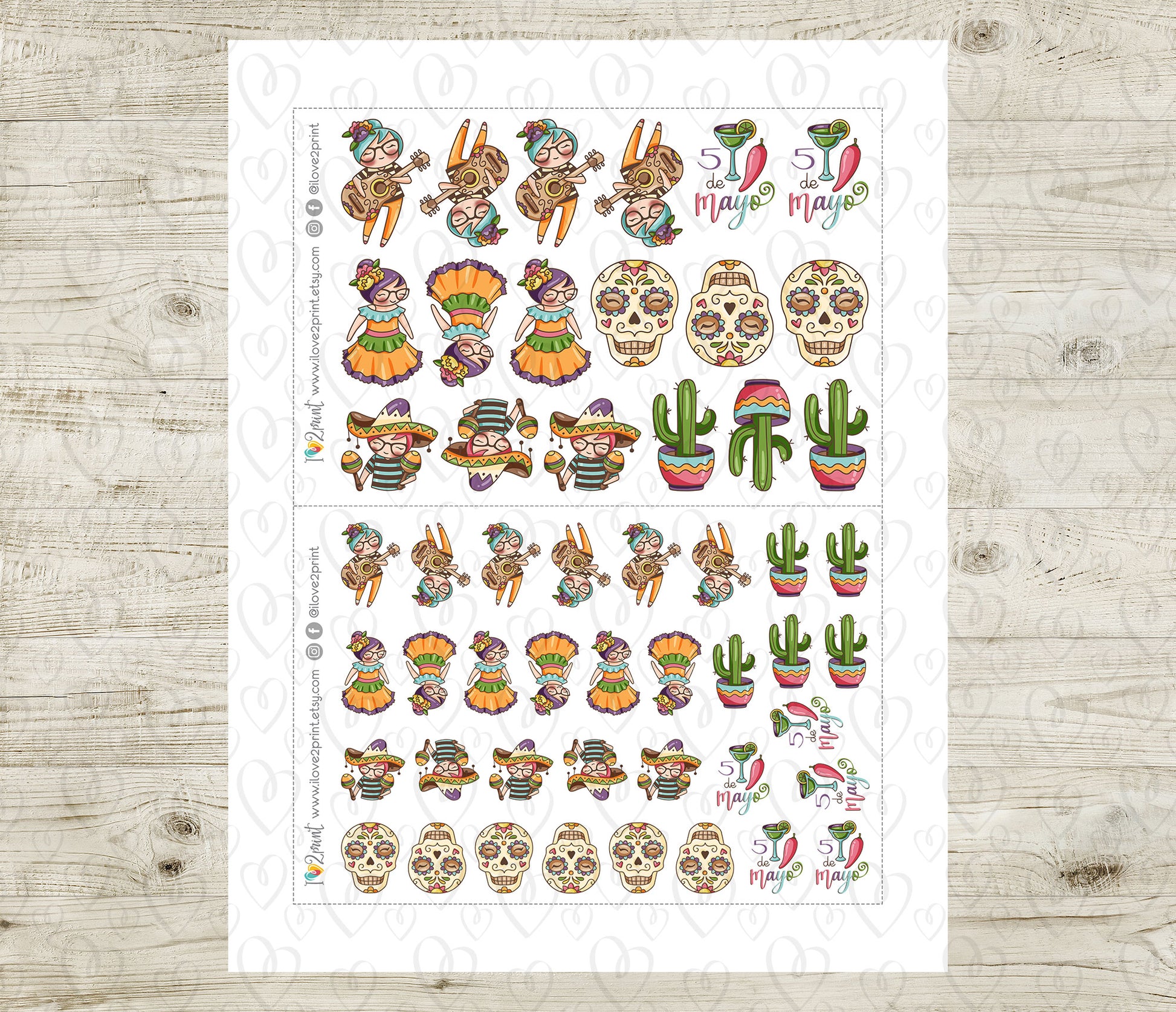 Sheet of decorative stickers with Mexican-themed designs on a wooden surface