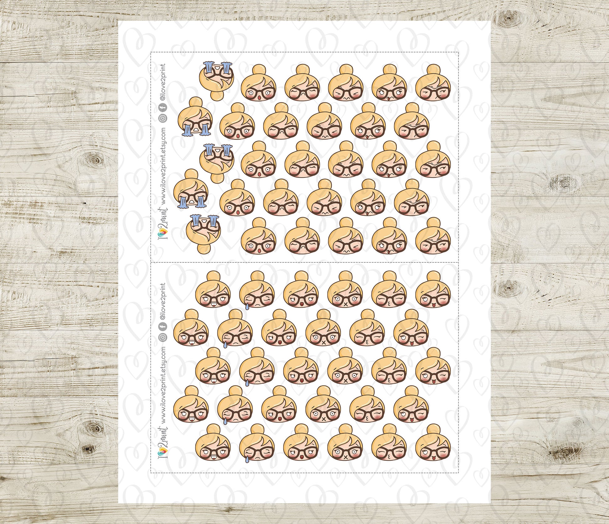 Sheet of emoji stickers with various blond hair girl face expressions on a wooden surface