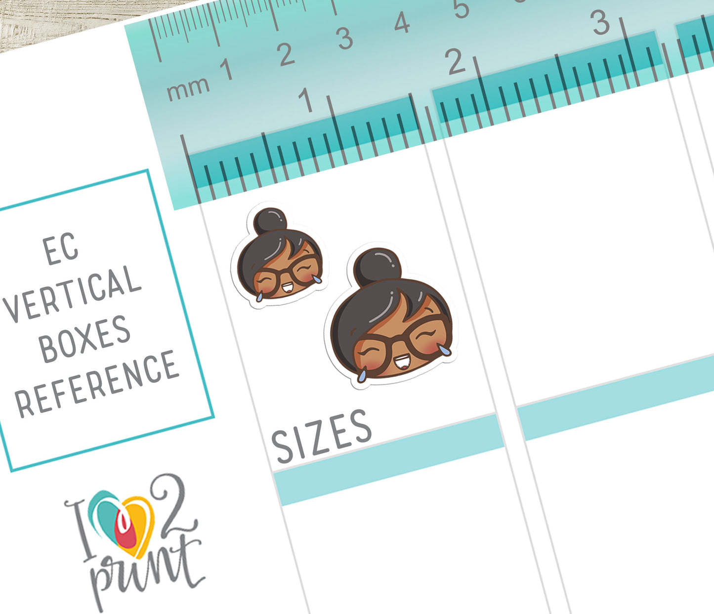 Sticker with a design of a person with a bun and glasses, labeled 'SIZES', on a white card with a ruler at the top.