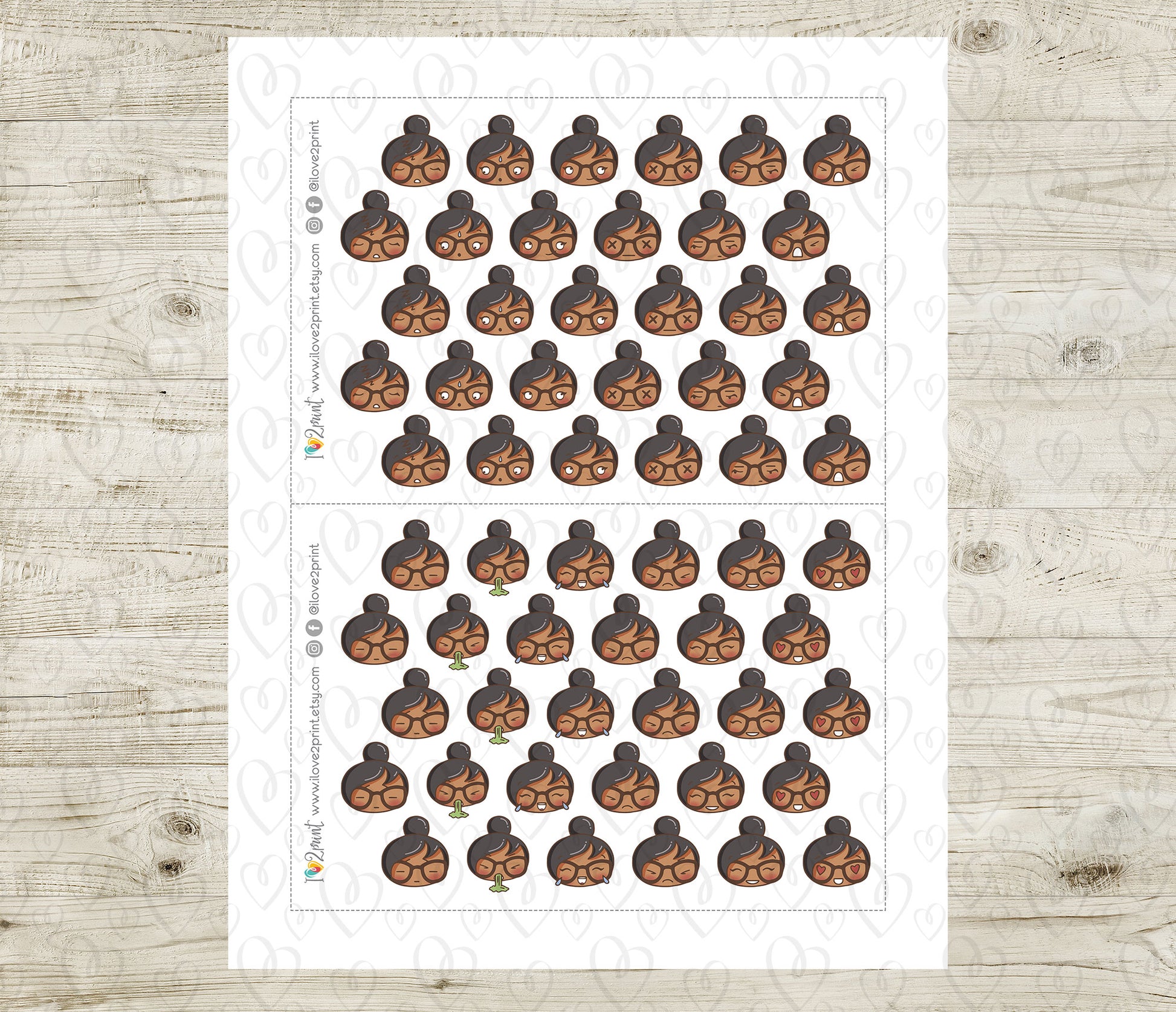 Sheet of stickers with illustrated women feelings on a wooden surface