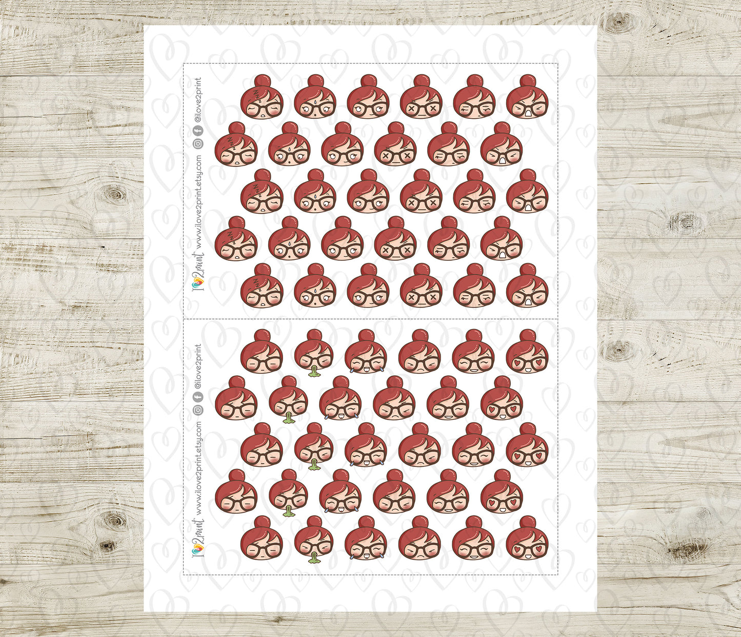 Sheet of red hair faces feelings stickers on a wooden surface