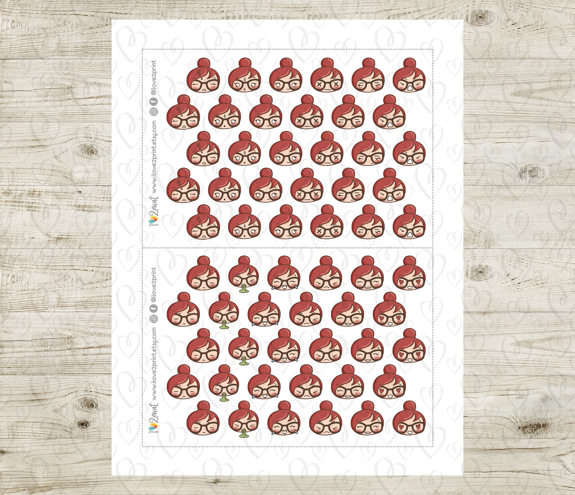Sheet of red hair faces feelings stickers on a wooden surface