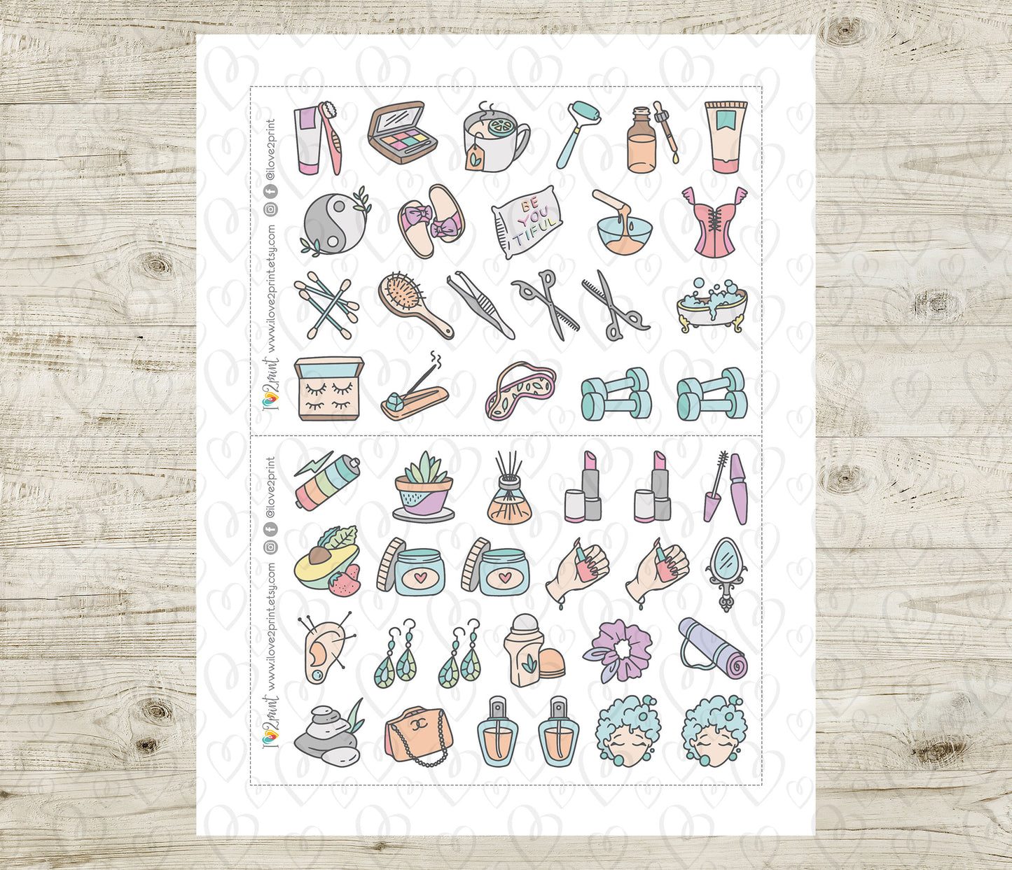 Sheet of colorful illustrated self care icons on a wooden surface