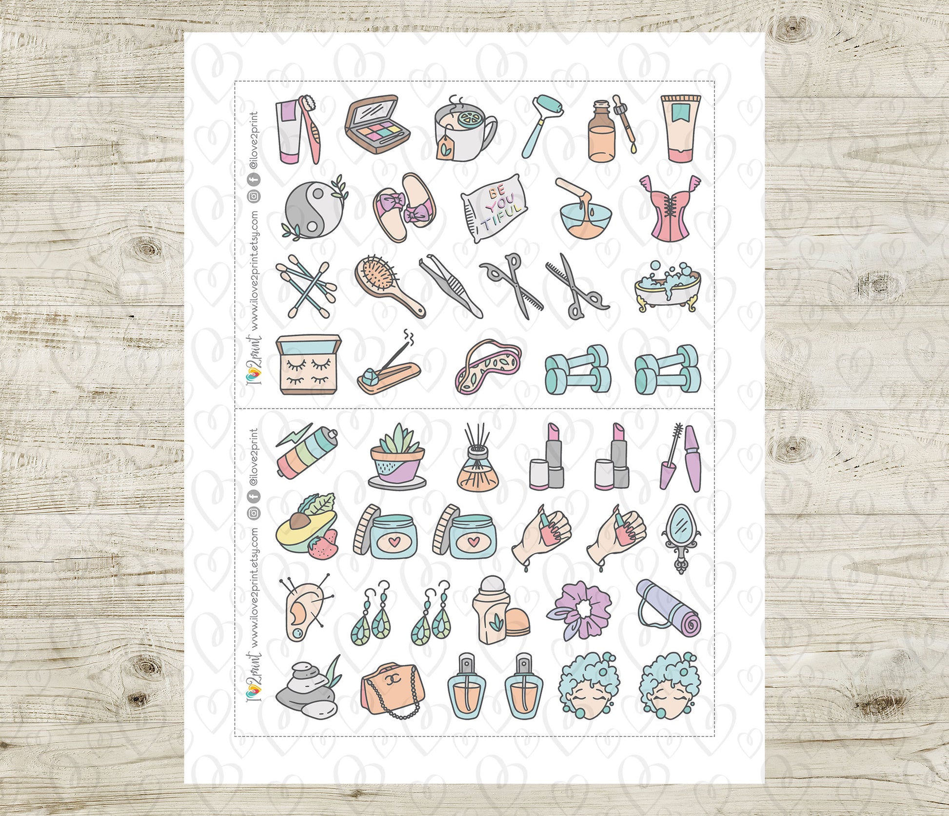 Sheet of colorful illustrated self care icons on a wooden surface