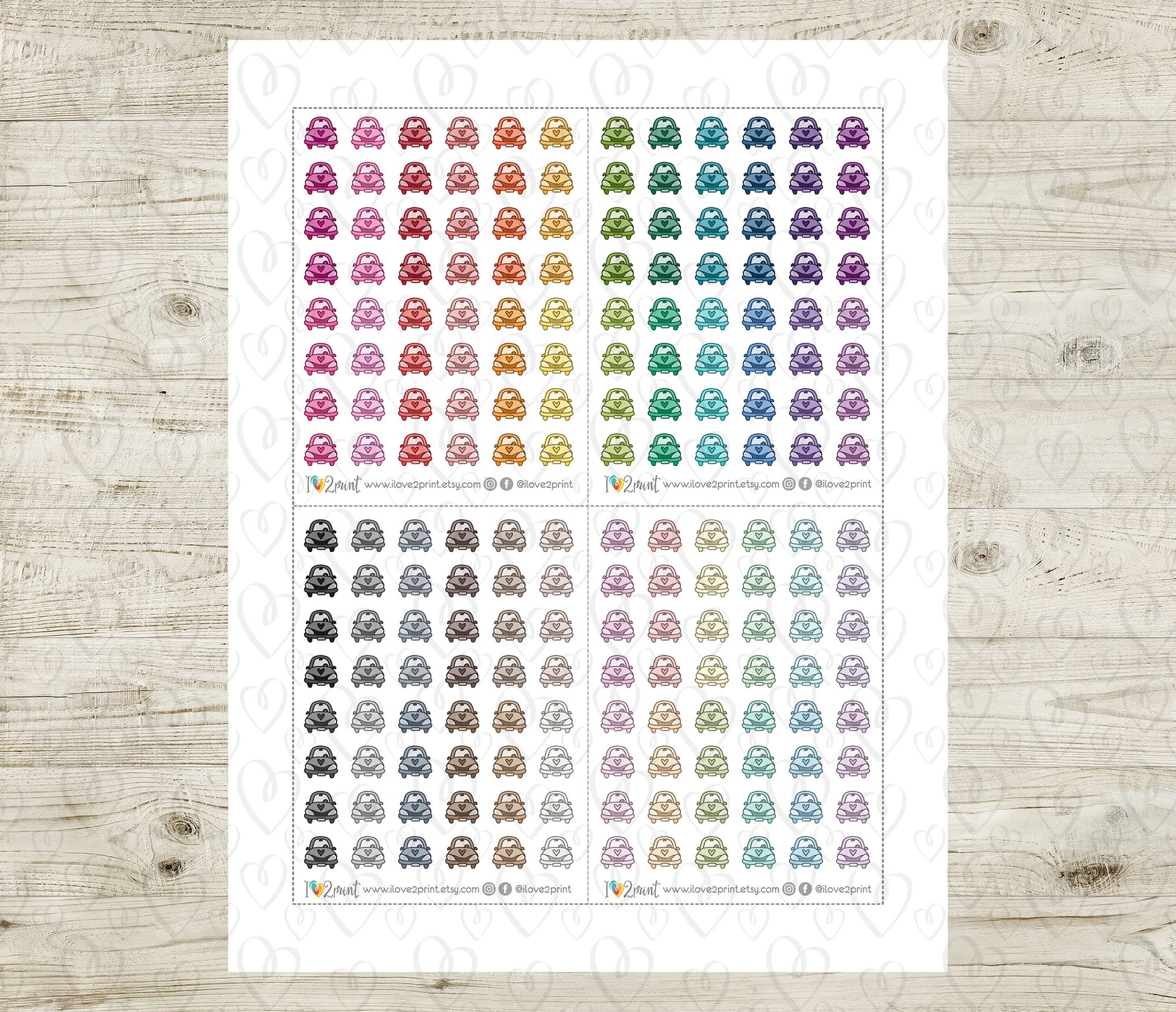 Sheet of colorful car stickers on a wooden surface