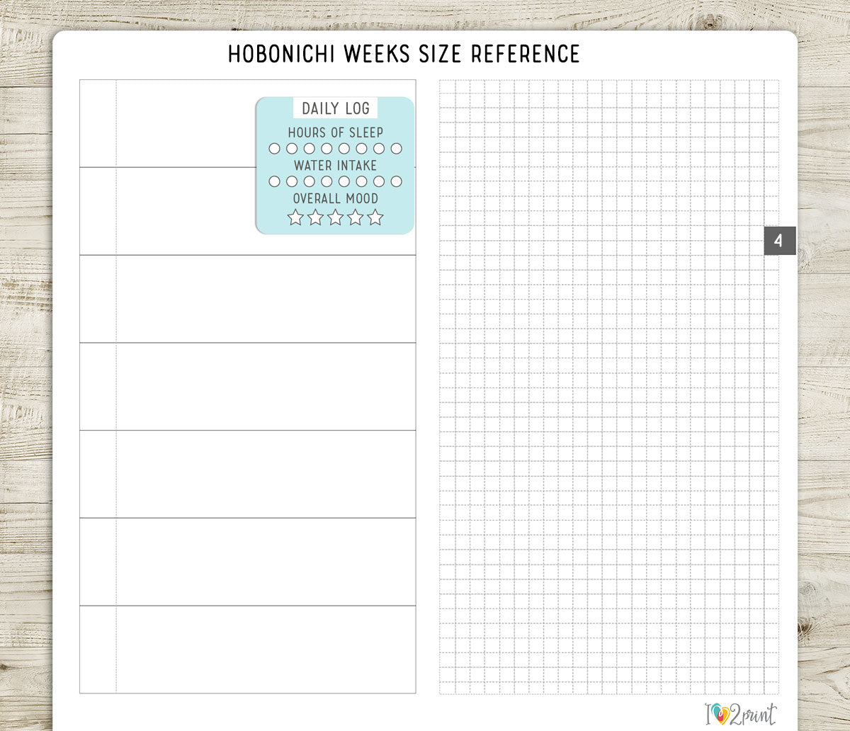 Hobonichi Weeks size reference grid sheet with daily log sticker on a wooden surface