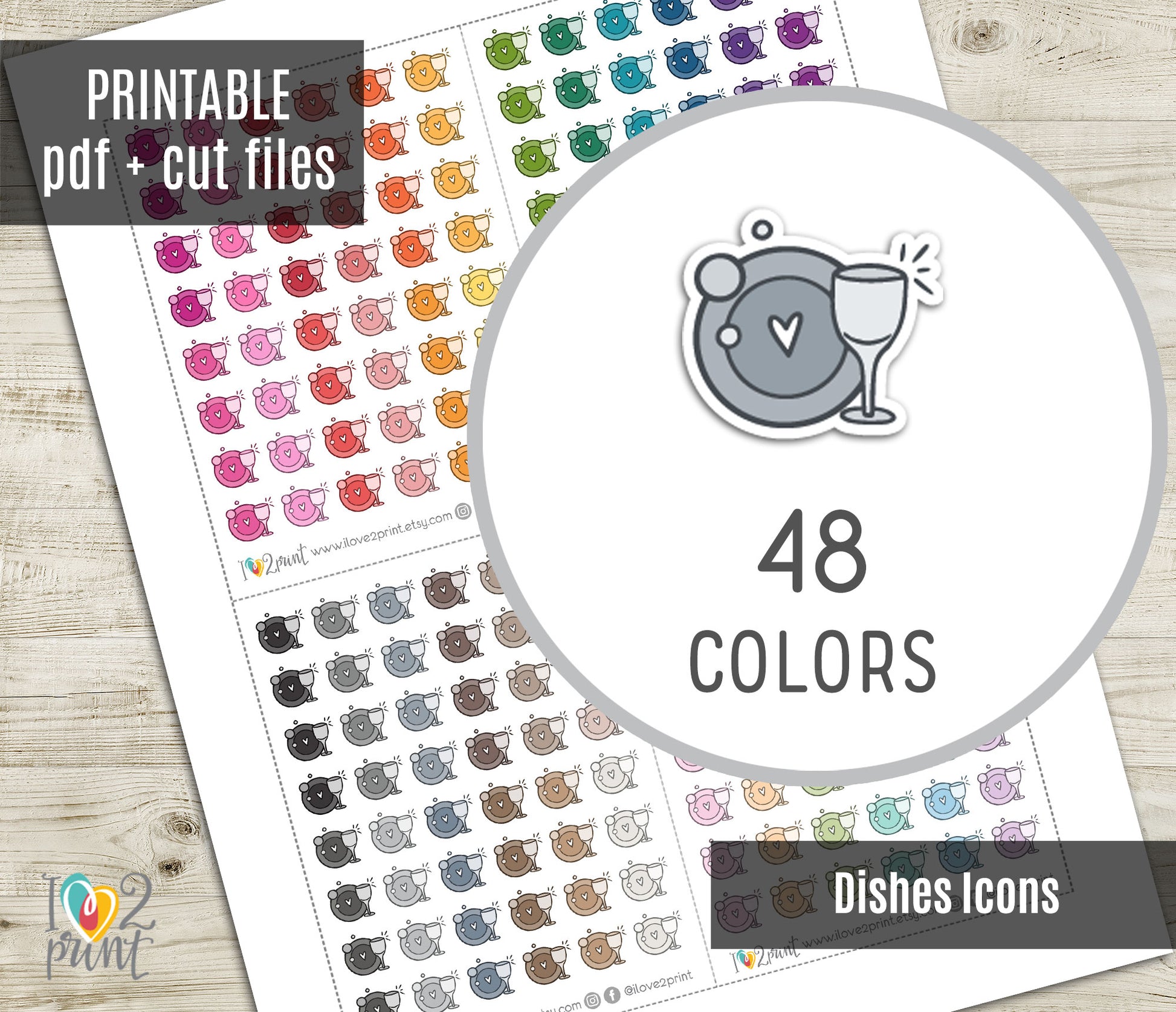 Sheet of colorful dishes icons stickers with a circular icon showing 48 colors on a wooden surface.