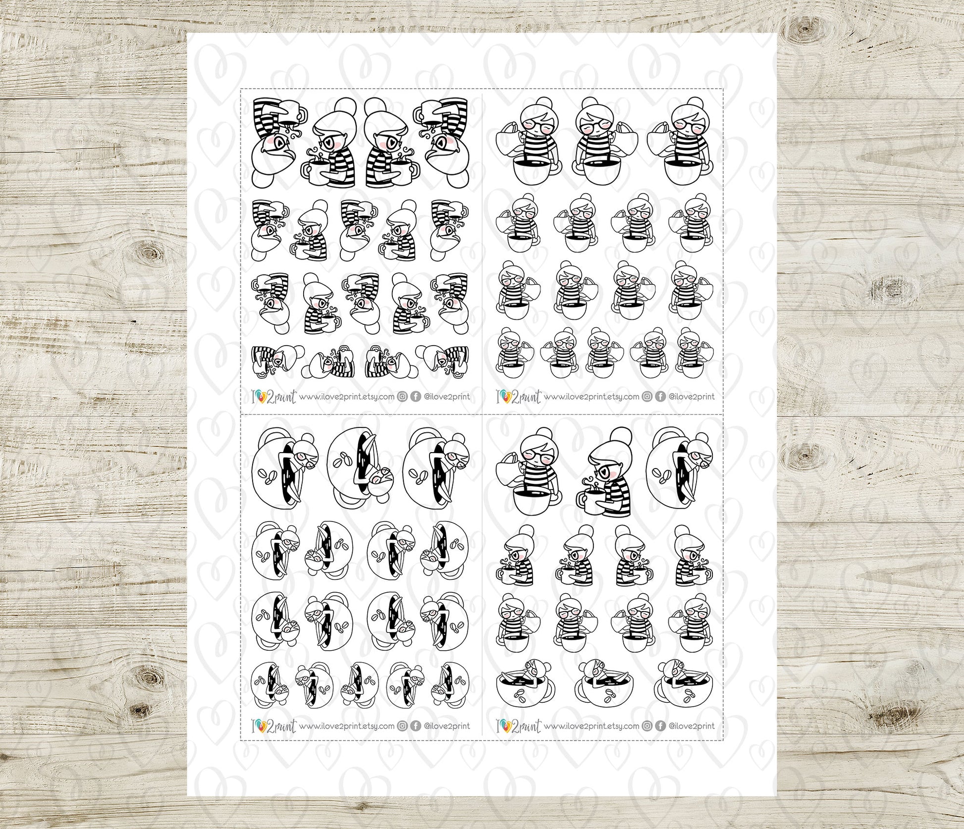 Sheet of black and white coffee stickers on a wooden surface