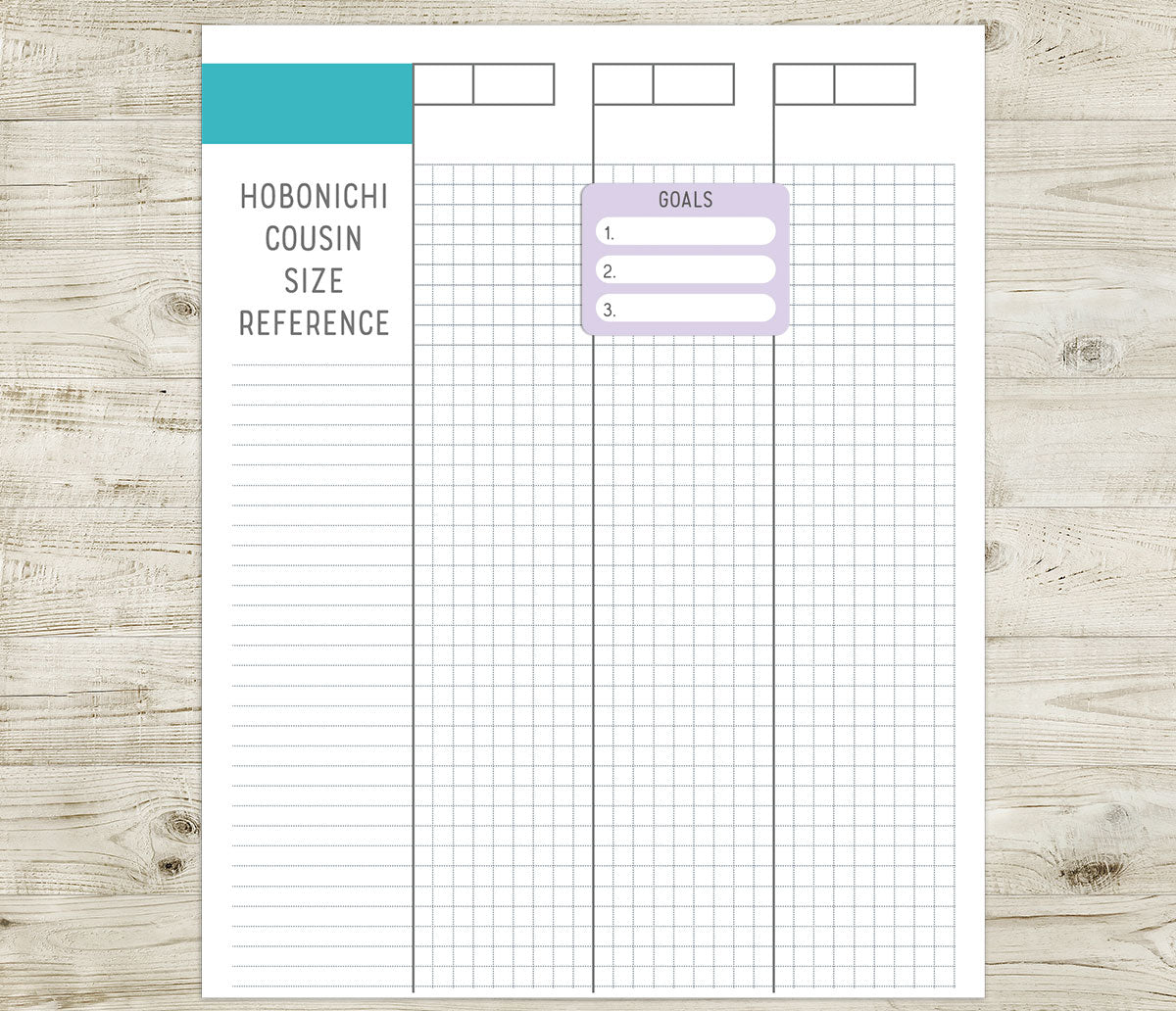 Goals sticker on a Hobonichi cousin size reference sheet on a wooden surface