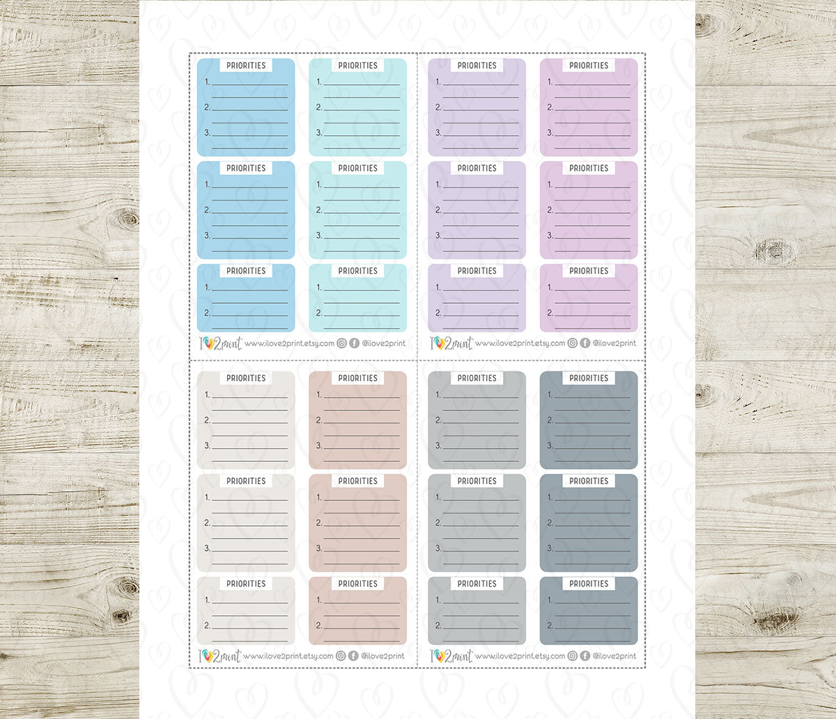 Set of priority labels in various pastel colors on a wooden surface