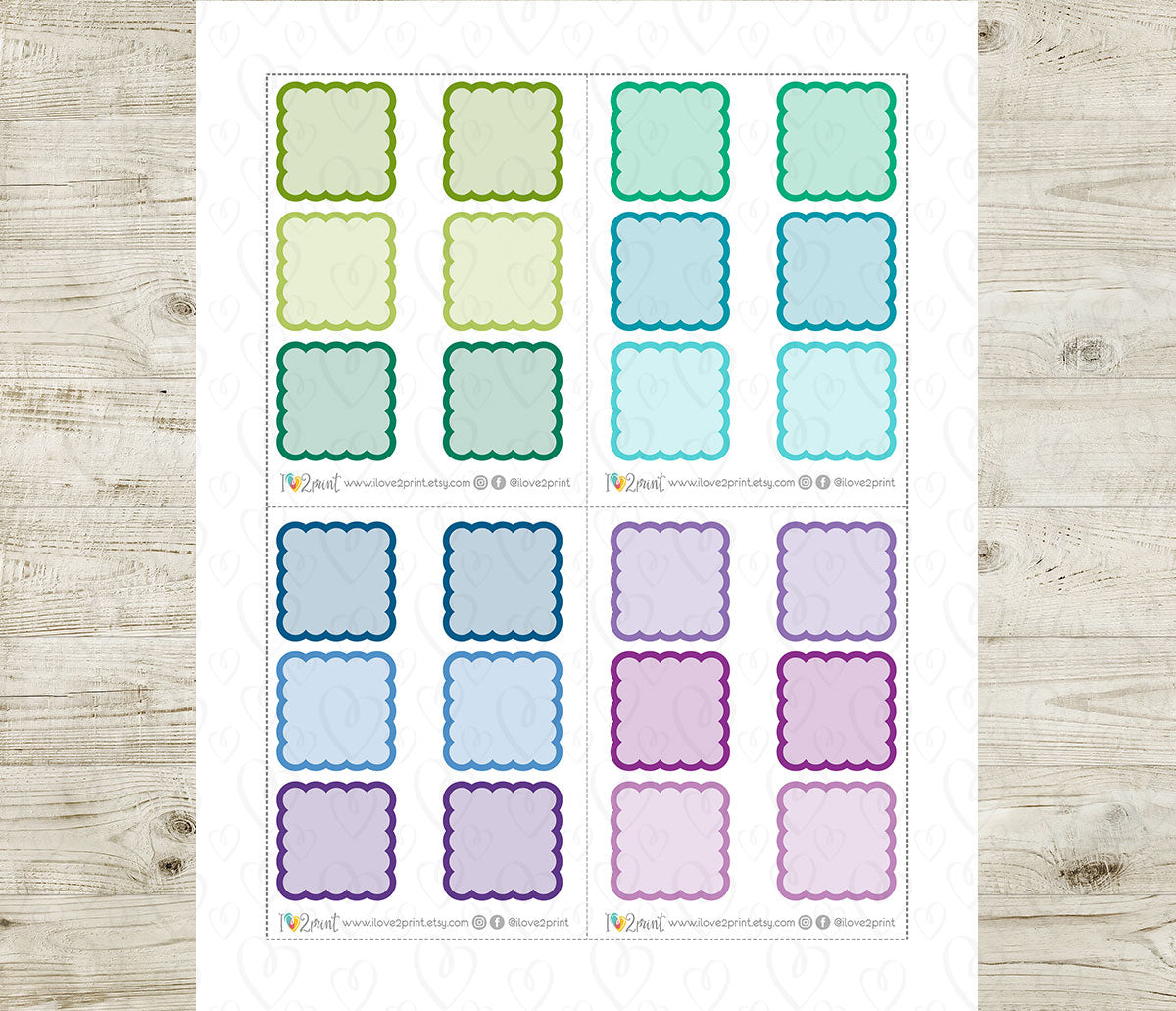 Sheet of colorful scallop boxes stickers on a wooden surface