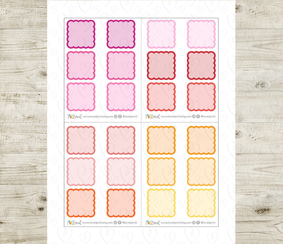 Sheet of decorative square stickers with scalloped edges on a wooden surface