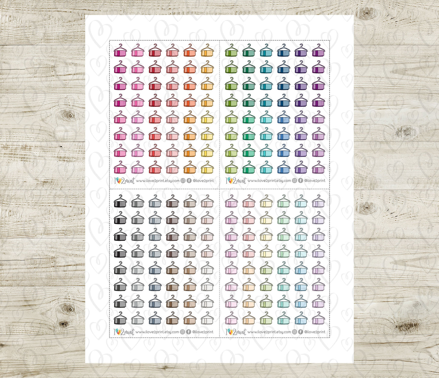 Sheet of colorful hanging towel icons stickers on a wooden surface