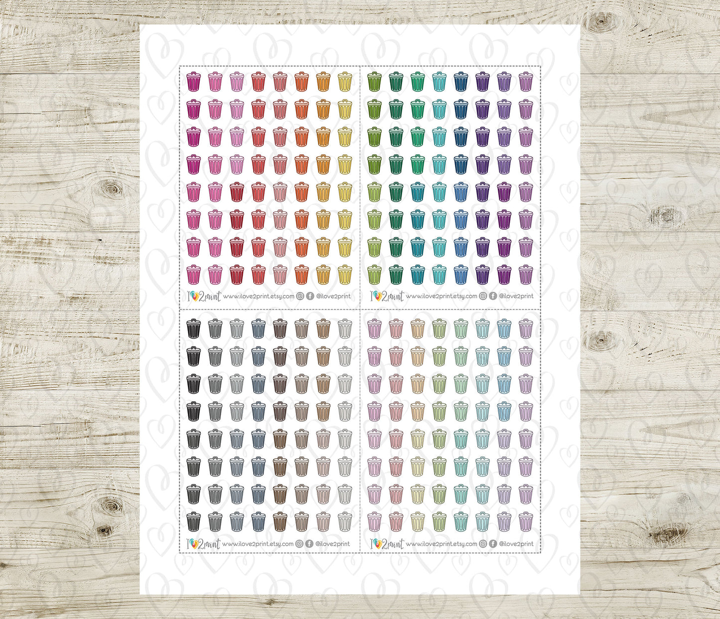 Sheet of colorful trash bin stickers on a wooden surface