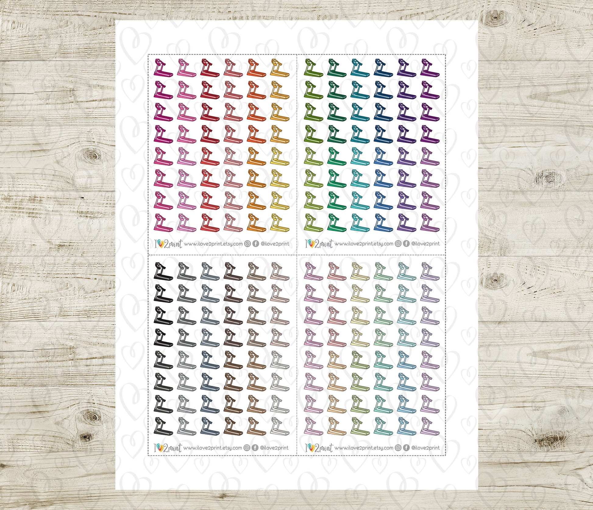 Sheet of colorful treadmill planner stickers on a wooden surface