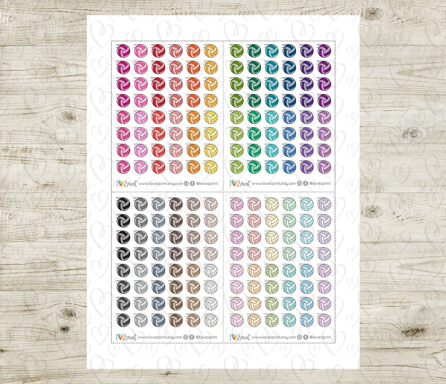 Sheet of colorful voley ball stickers on a wooden surface