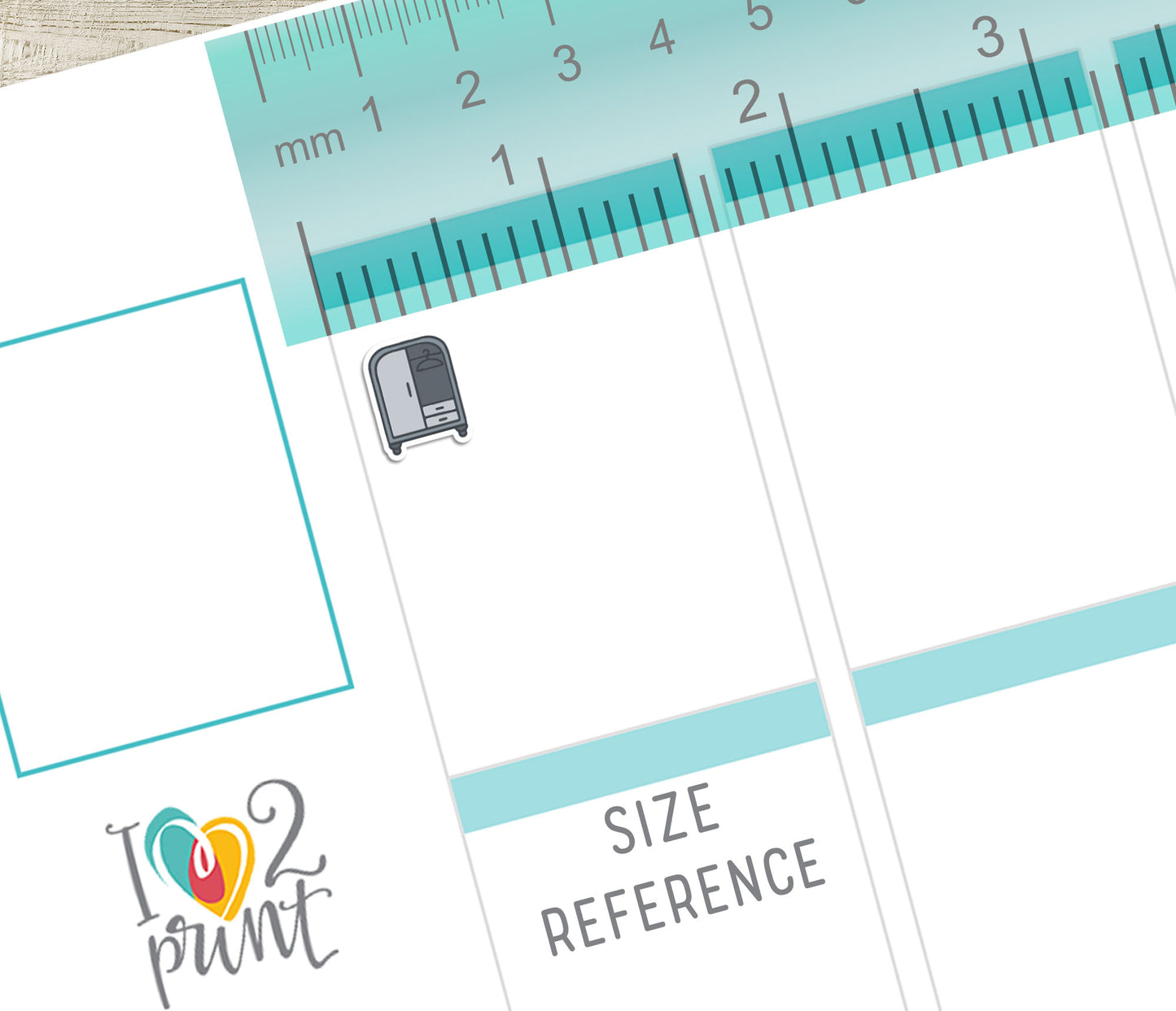 Wardrobe planner stickers with a ruler for size reference on a vertical planner size